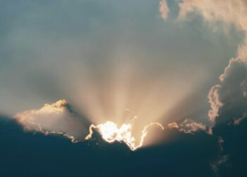 Clouds with sun shining through