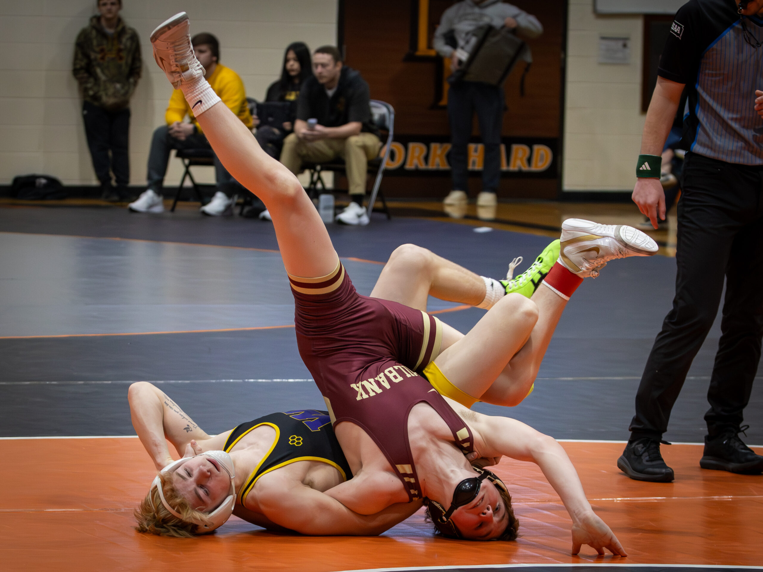 Brody Randall of Watertown looks for back points against his opponent of Milbank