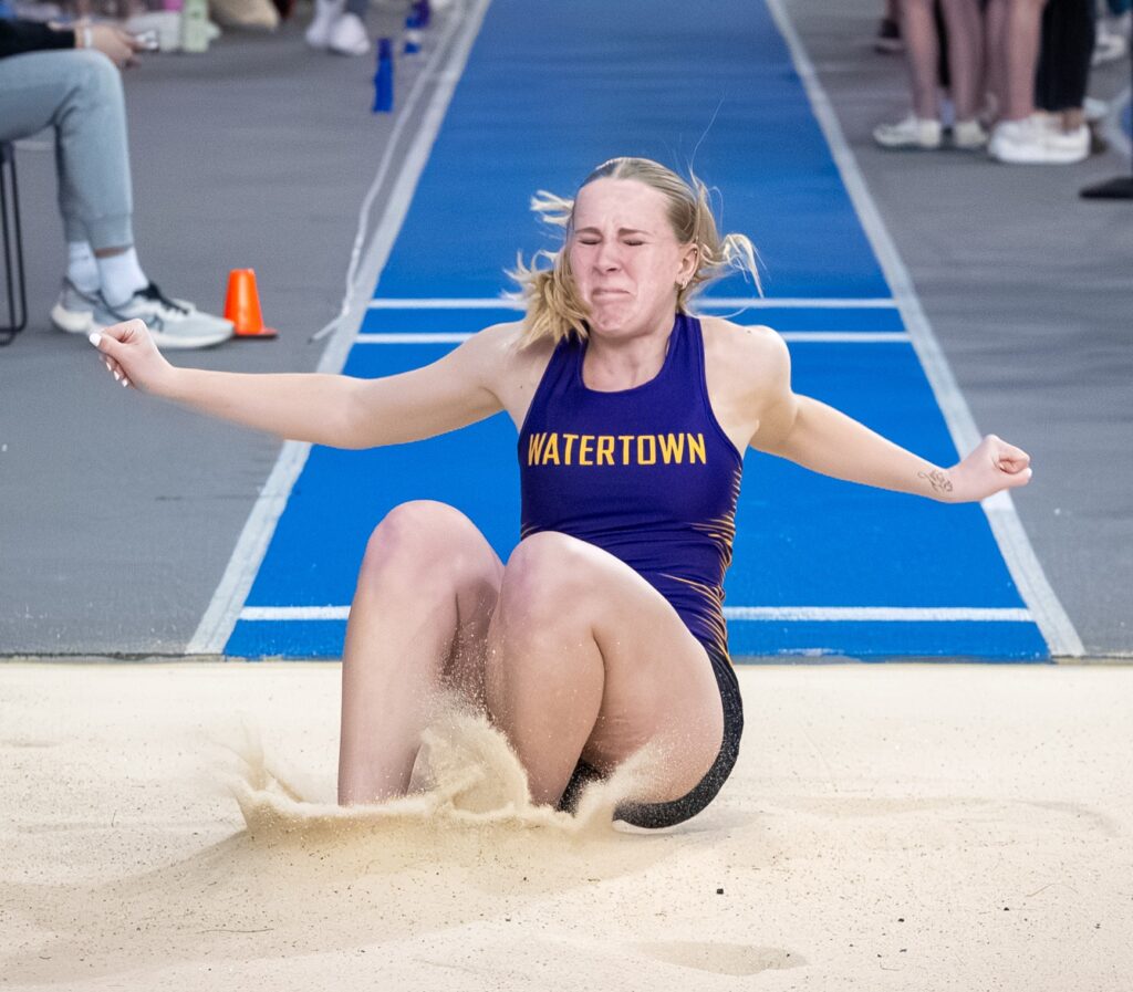 Cadence Weidner enters the sandpit while competing in long jump