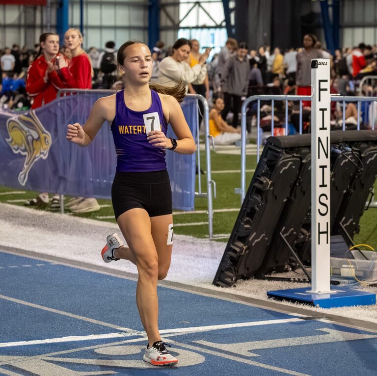 Grace McElroy crosses the finish line she finished first place in the two mile run