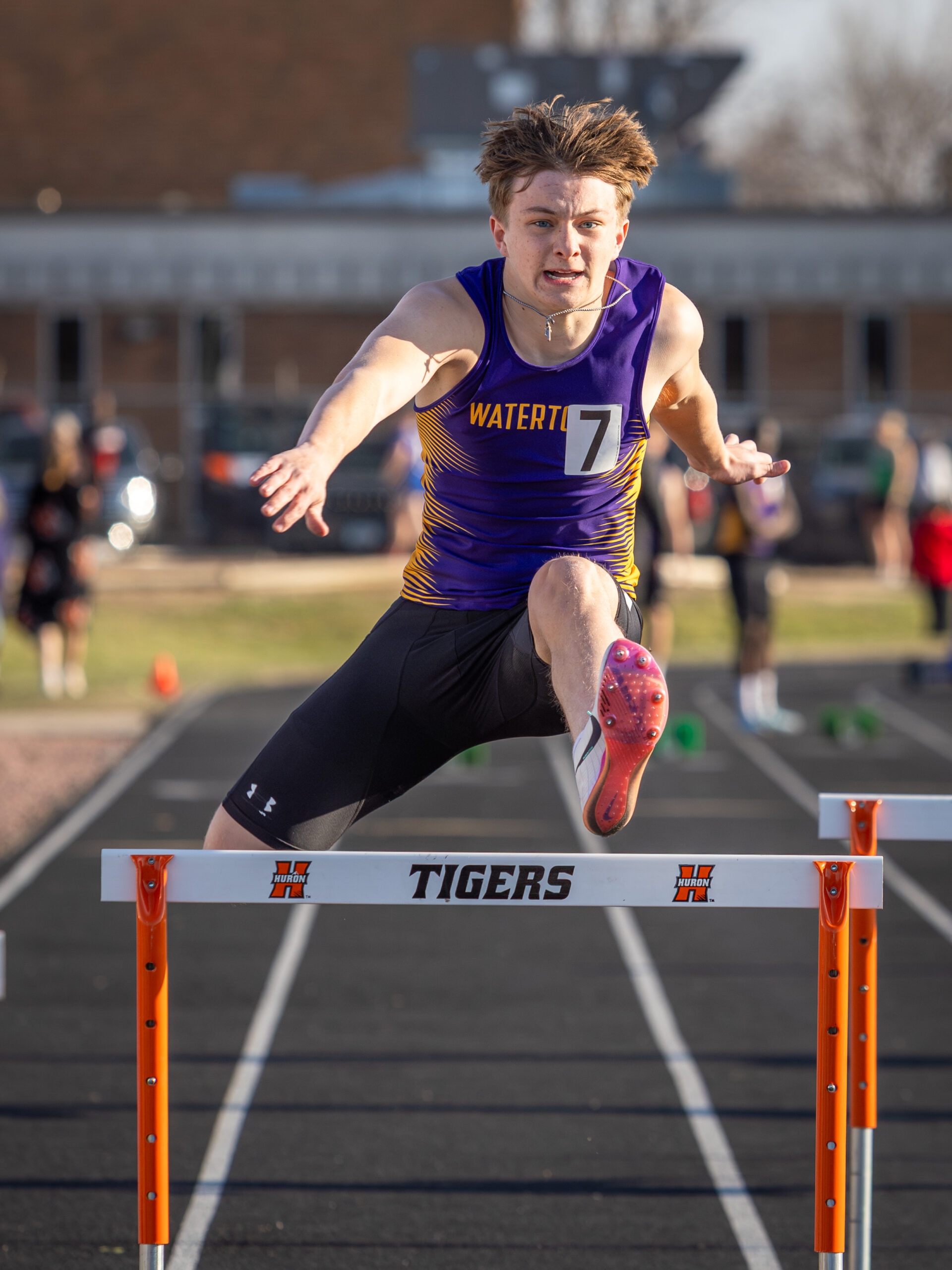 Gage Robison while running hurdles