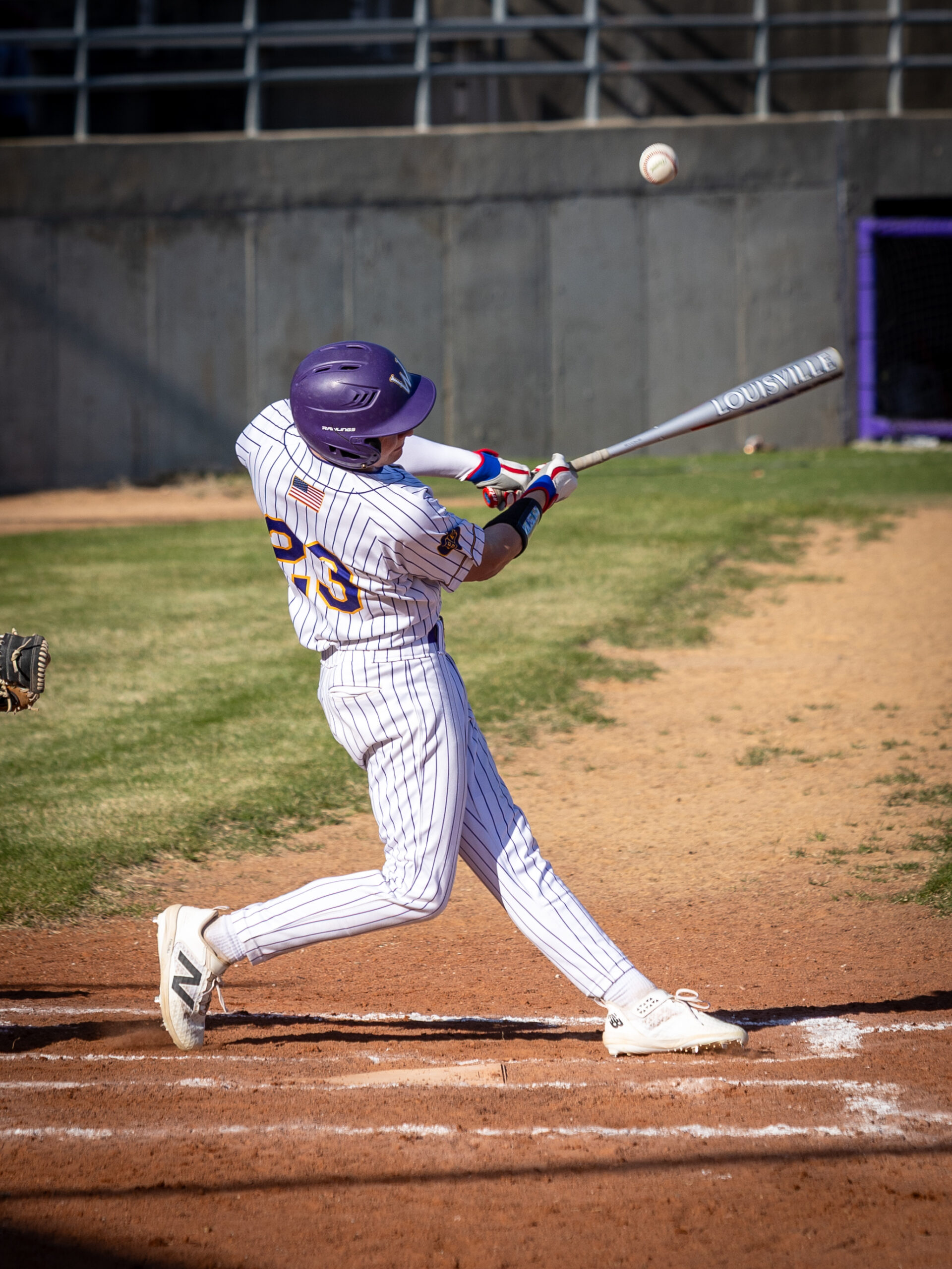 Jaxon Falak hits the ball