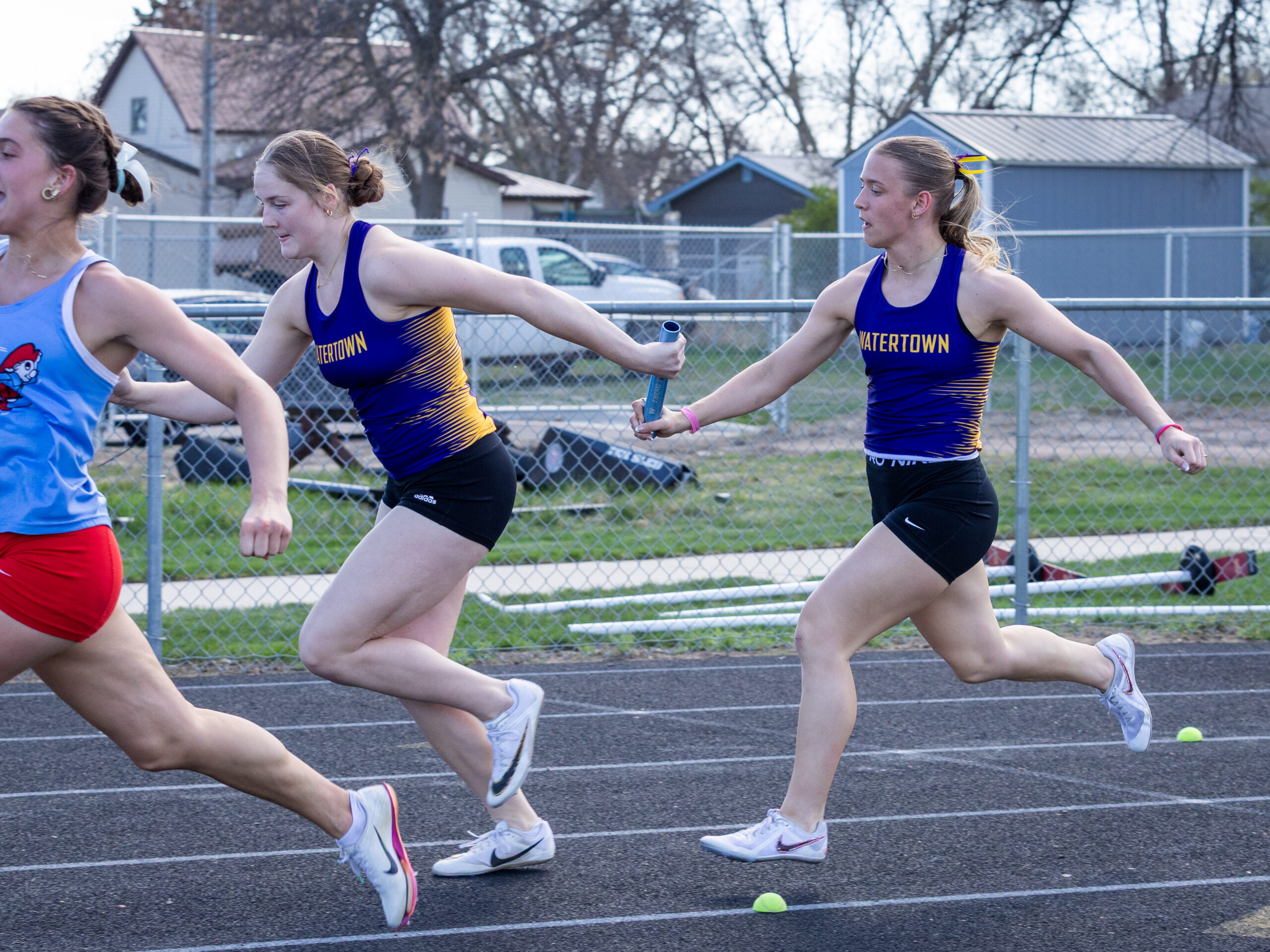 Brooke Grajczyk passes the baton to Carighan Klatt