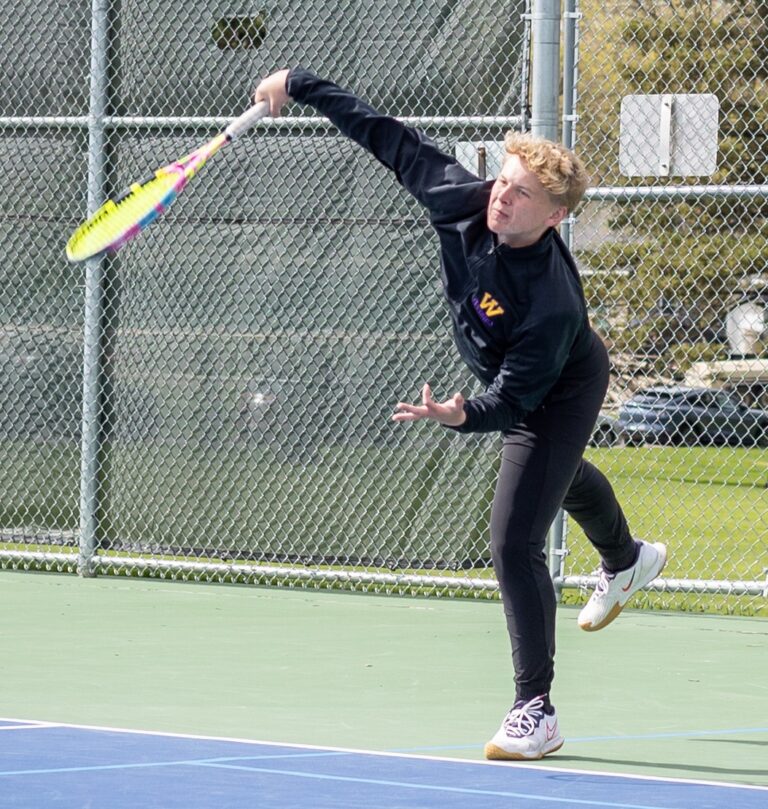 Matthew Bertsch after hitting the ball over the net