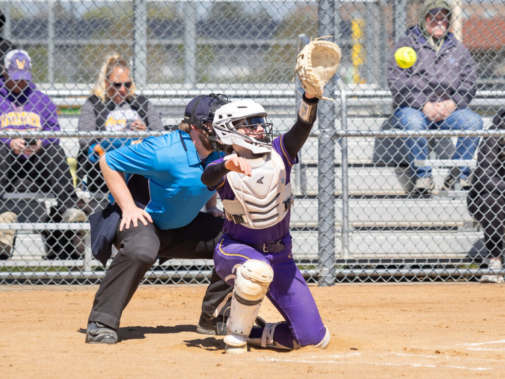 Kenley Martenson adjusts to catch the ball after the batter tipped it