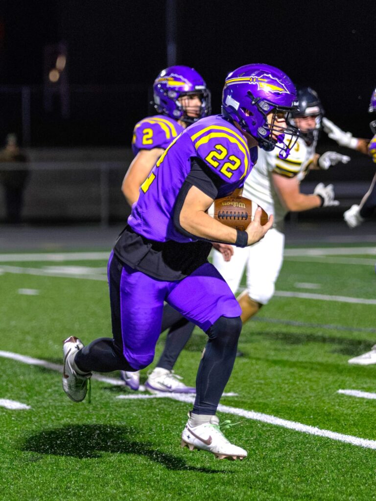 Tyson Miller runs the ball