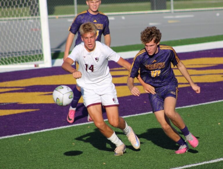 Kasen Bender battles for the ball against Spearfish